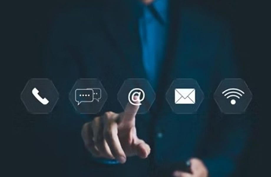 Person interacting with digital communication icons.
