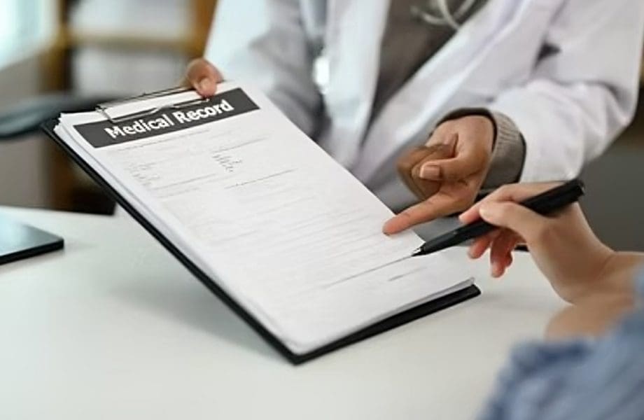 Doctor reviewing a patient's medical record.