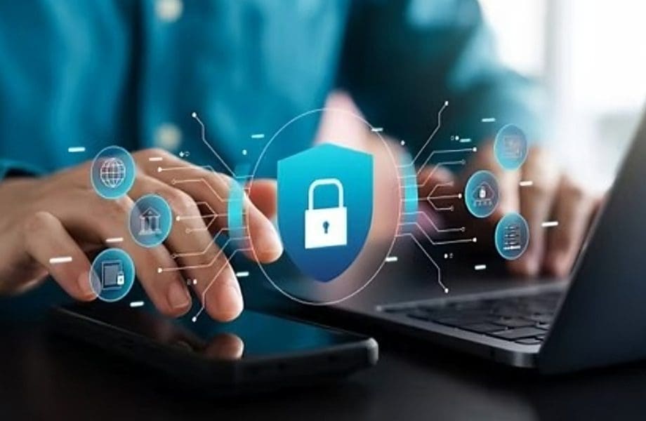 Cybersecurity concept with laptop and smartphone.