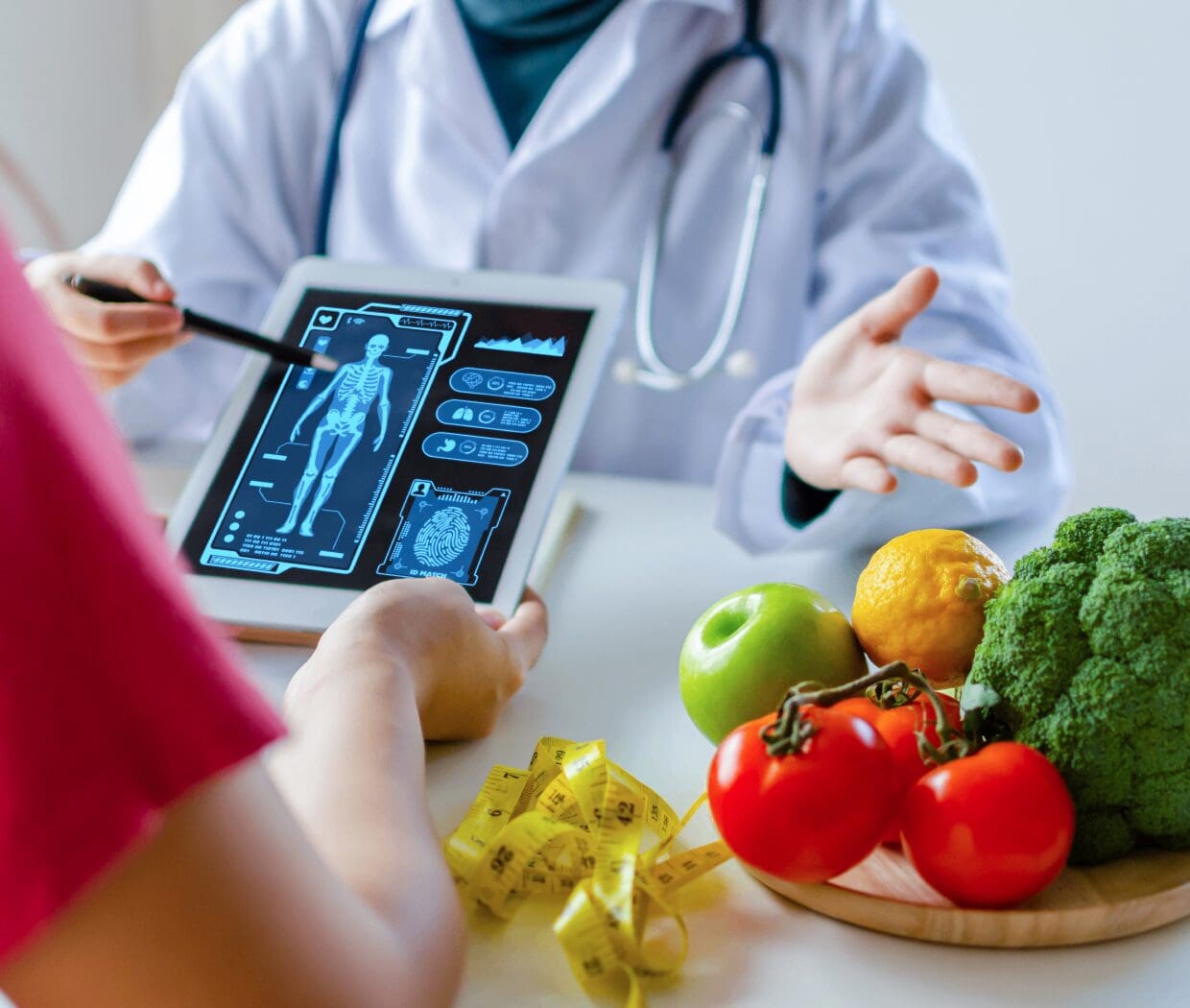 Doctor discussing health with digital tablet and vegetables.
